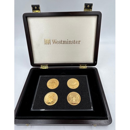 779 - A large quantity of gold plated proof coins/medallions to include 5 x 2014 WW1 Centenary, 4 x one do... 