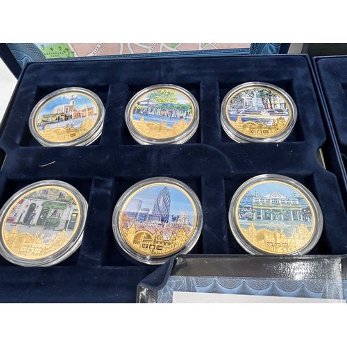 779 - A large quantity of gold plated proof coins/medallions to include 5 x 2014 WW1 Centenary, 4 x one do... 