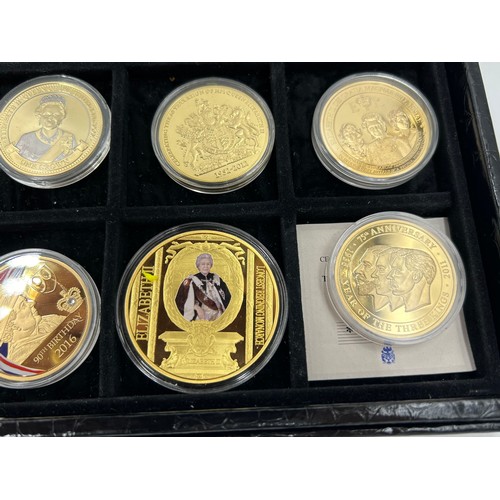 779 - A large quantity of gold plated proof coins/medallions to include 5 x 2014 WW1 Centenary, 4 x one do... 