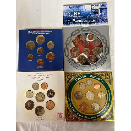 786 - A quantity of uncirculated coin collections to include 5 x Britains First Decimal Coins, Churchill, ... 