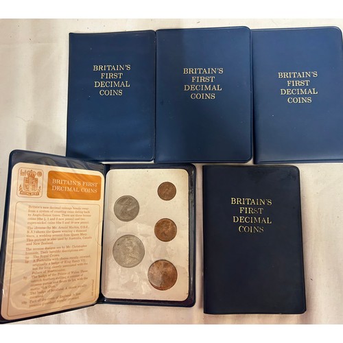 786 - A quantity of uncirculated coin collections to include 5 x Britains First Decimal Coins, Churchill, ... 