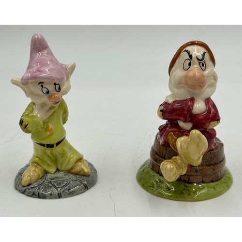 453 - Royal Doulton handmade and hand painted collection of Snow White and The Seven Dwarfs limited editio... 