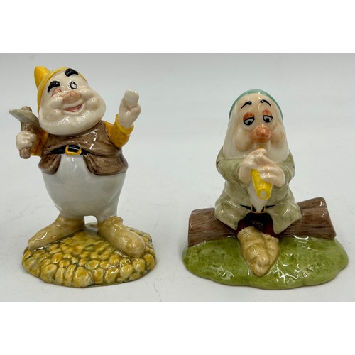 453 - Royal Doulton handmade and hand painted collection of Snow White and The Seven Dwarfs limited editio... 