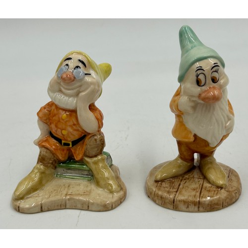 453 - Royal Doulton handmade and hand painted collection of Snow White and The Seven Dwarfs limited editio... 