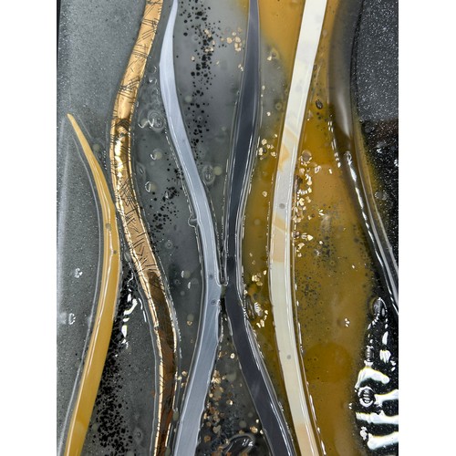 499 - Lisa Villarospo Contemporary Fused Glass picture in silver, gold and black on a solid black backgrou... 