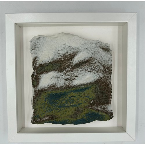 430 - A Pair of Contemporary Ceramic artworks in white box frames depicting landscapes/sea/mountains 25.5c... 