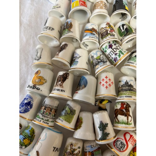 450 - A collection 178 Thimbles to include one silver Birmingham M.Kamin & Co 1983, 3 x Wedgwood, 5 x Roya... 