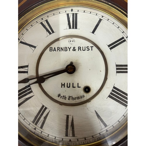 1125 - Two 19thC clocks to include a Seth Thomas Drop Dial 8-day Wall Clock by Barnby & Rust of Hull comple... 