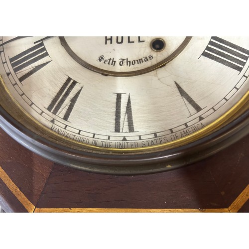 1125 - Two 19thC clocks to include a Seth Thomas Drop Dial 8-day Wall Clock by Barnby & Rust of Hull comple... 