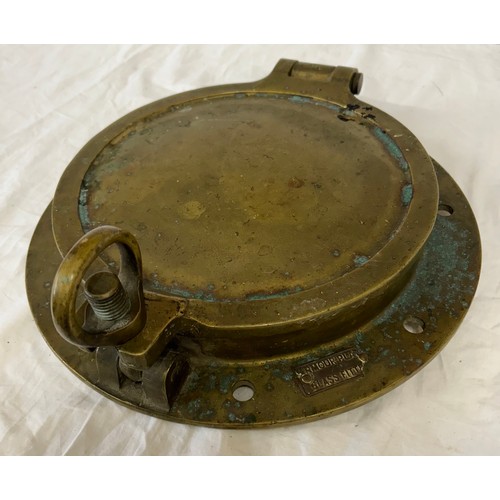 1069 - Heavy solid Brass Ships Porthole with armour plated fitted glass, 37cm d with glass 25cm.