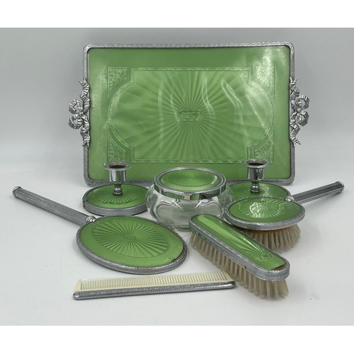 1406 - A miscellany to include a Green 8-piece Art Deco Dressing Table Set, 2 x Gilt needlepoint Candle hol... 