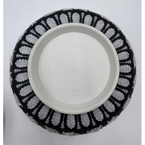 396 - Two Black Wedgwood Jasperware bowls, footed 13cm h x 19.5cm d and the other 9cm h x 19.5cm d along w... 