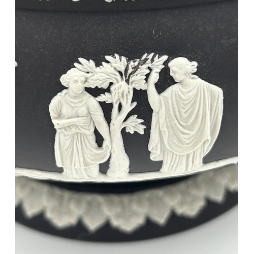 396 - Two Black Wedgwood Jasperware bowls, footed 13cm h x 19.5cm d and the other 9cm h x 19.5cm d along w... 