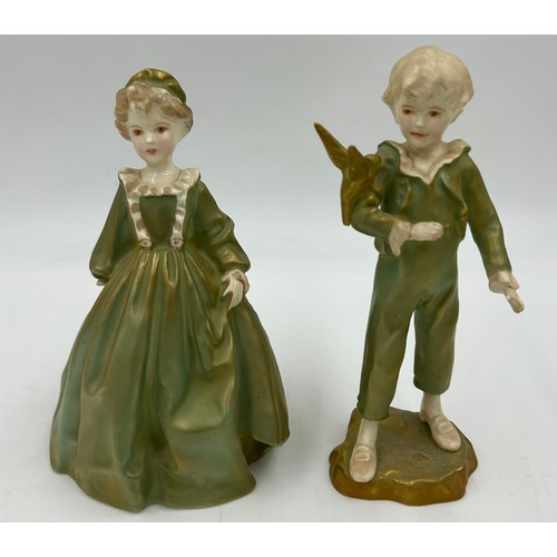 397 - A pair of Royal Worcester porcelain candle sticks green marked to base 27cm high, together with a pa... 