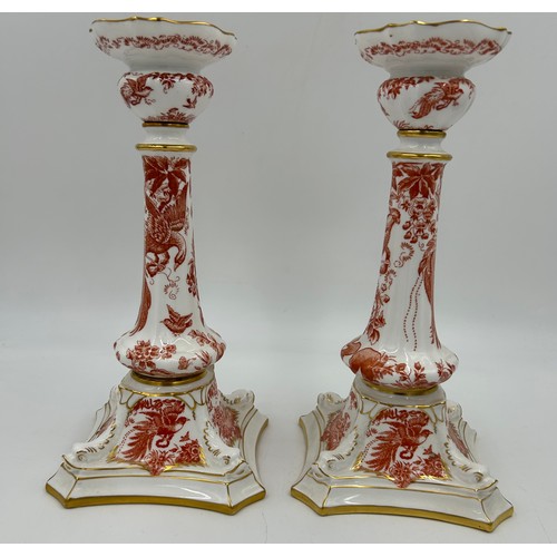 398 - A pair of Royal Crown Derby Red Aves A.74 pattern candlesticks along with 2 matching snuffers (4).