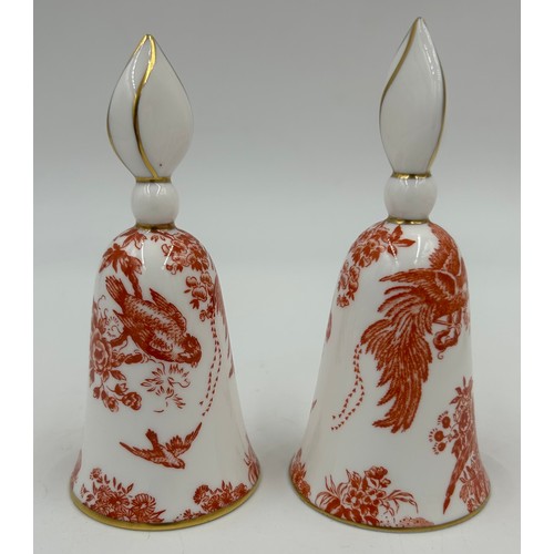 398 - A pair of Royal Crown Derby Red Aves A.74 pattern candlesticks along with 2 matching snuffers (4).