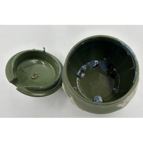 399 - A collection of green Wedgwood Jasperware to include 2 twin handled urns on with lid largest 20cm, a... 