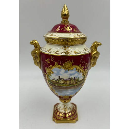 407 - A quantity of Coalport ceramics to include a lidded urn hand painted by Malcolm Harnett to commemora... 