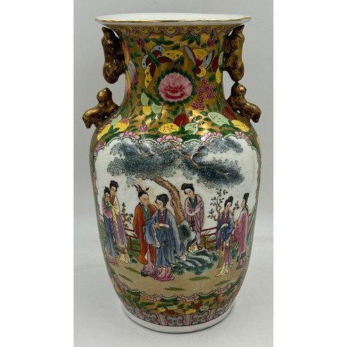 1007 - A pair of 20thC Chinese famille rose vases. 36cm h.