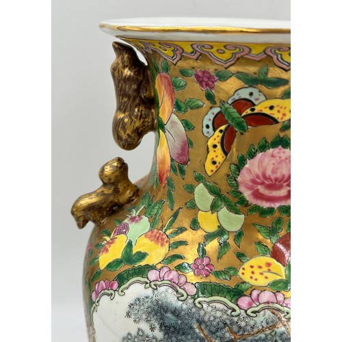 1007 - A pair of 20thC Chinese famille rose vases. 36cm h.