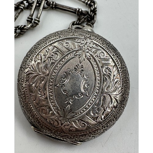 877 - A Continental silver pocket watch 4cm diameter, together with a hallmarked silver fob chain, marks i... 