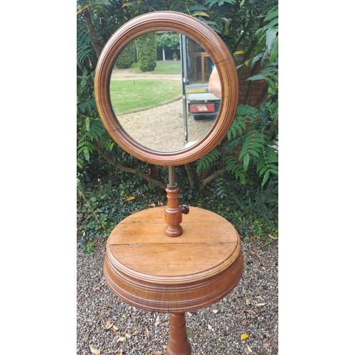 24 - A Gothic revival walnut shaving stand 160cm h x 45cm.