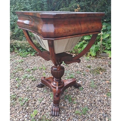 25 - A Victorian rosewood sewing table with fitted interior. 69cm h x 52cm w x 41cm d.