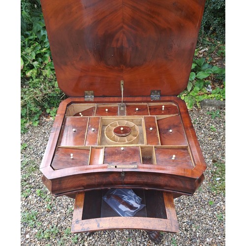 25 - A Victorian rosewood sewing table with fitted interior. 69cm h x 52cm w x 41cm d.