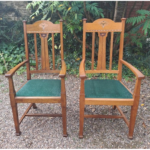 27 - A set of eight Shapland & Petter oak inlaid dining chairs, six single and two carvers. 110cm h x 39c... 