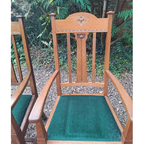 27 - A set of eight Shapland & Petter oak inlaid dining chairs, six single and two carvers. 110cm h x 39c... 