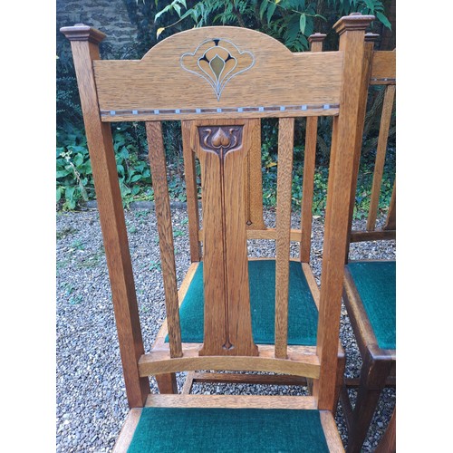 27 - A set of eight Shapland & Petter oak inlaid dining chairs, six single and two carvers. 110cm h x 39c... 