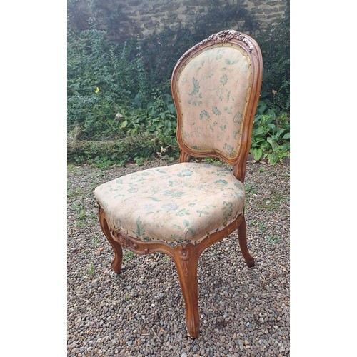 28 - Seven late 18thC French walnut salon chairs with carved roses. One chair with arms. 89cm h x 49cm w ... 