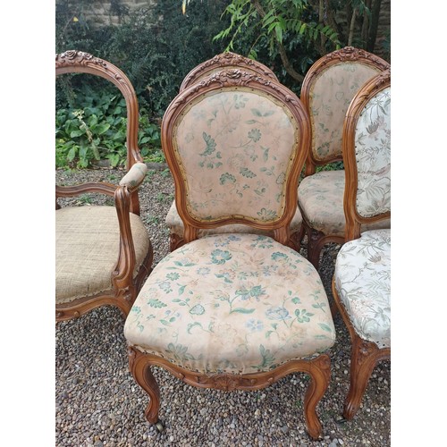 28 - Seven late 18thC French walnut salon chairs with carved roses. One chair with arms. 89cm h x 49cm w ... 