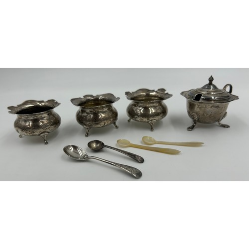 875 - Three Silver Salt Cellars engraved with J and a spoon by Charles Edwards London 1907, a Mustard Pot ... 