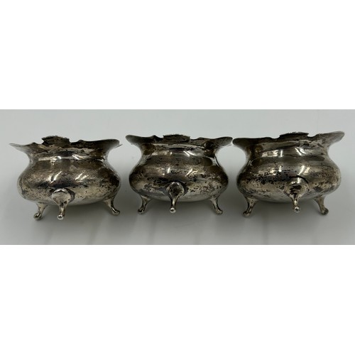 875 - Three Silver Salt Cellars engraved with J and a spoon by Charles Edwards London 1907, a Mustard Pot ... 