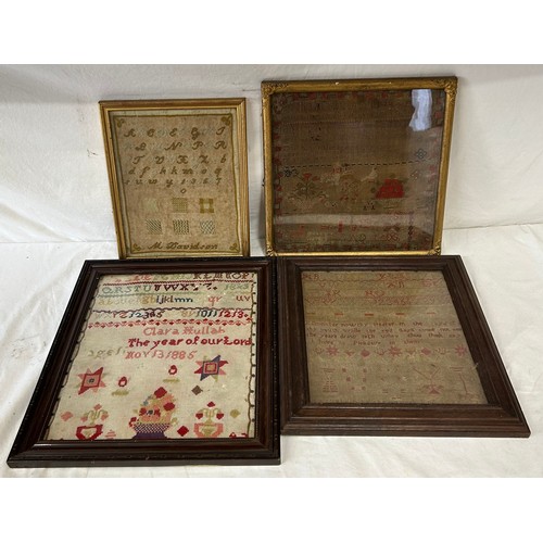 949 - Four mid 19thC framed samplers to include Clara Hullah Nov 13 1885, one dated 1877, another marked M... 