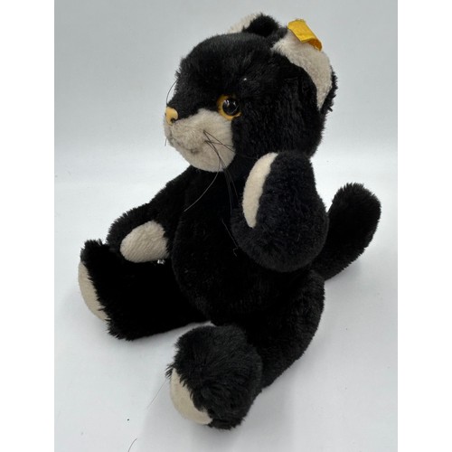 1303 - Five Steiff Soft Toys to include 2 x Old English Sheep Dogs 28cm h, Black Cat with whiskers, Badger ... 