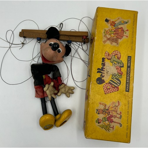 1305 - Five vintage Pelham Puppets to include Pinocchio, Mickey Mouse, Minnie Mouse, Goofy and Rupert The B... 