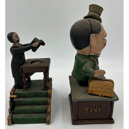 1431 - Two late 19thC Cast Iron Money Boxes 'Magicians Bank' mechanically working with stopper to base 19cm... 