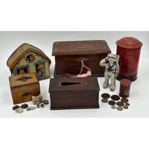 1432 - A miscellany of items to include a 19thC Commercial Travellers Oak Money Box with two keys and openi... 