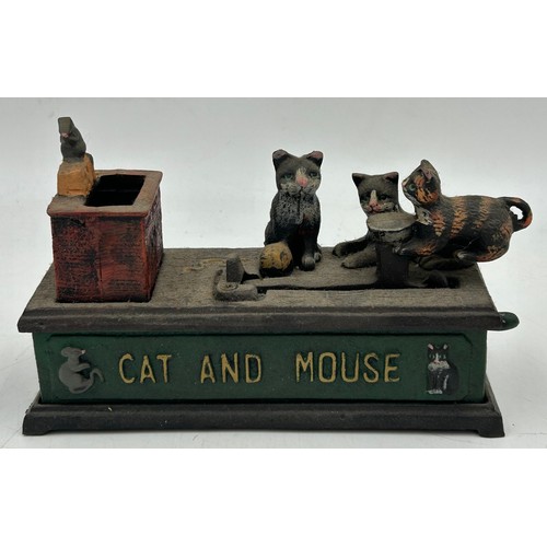 1423 - A collection of cast iron Novelty Money Boxes to include Trick Dog, Cat and Mouse, Elephant, U.S Mai... 