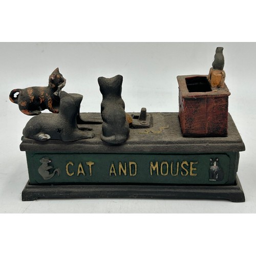 1423 - A collection of cast iron Novelty Money Boxes to include Trick Dog, Cat and Mouse, Elephant, U.S Mai... 