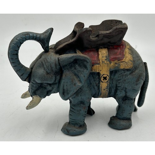 1423 - A collection of cast iron Novelty Money Boxes to include Trick Dog, Cat and Mouse, Elephant, U.S Mai... 