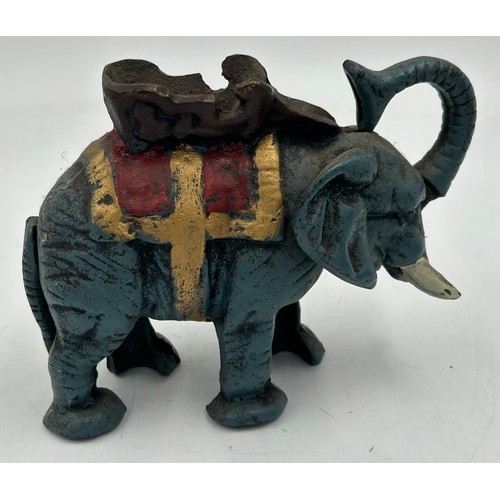 1423 - A collection of cast iron Novelty Money Boxes to include Trick Dog, Cat and Mouse, Elephant, U.S Mai... 