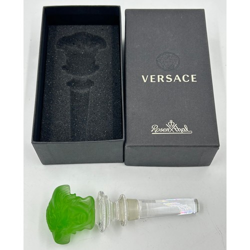 501 - A Versace Rosenthal glass bottle stopper, a London 1922 Willian Henry Sparrow perfume bottle togethe... 