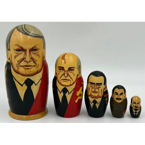 463 - A collection of Russian Matryoshka wooden dolls to include Humpty Dumpty, Arsenal Football team, Rus... 