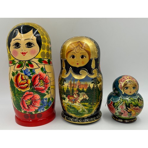 463 - A collection of Russian Matryoshka wooden dolls to include Humpty Dumpty, Arsenal Football team, Rus... 