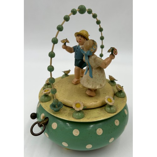 465 - A quantity of Erzgebirge hand painted German wooden music boxes, Wendt & Kuhn to include Apple, Gard... 