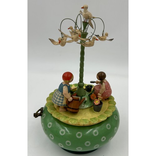 465 - A quantity of Erzgebirge hand painted German wooden music boxes, Wendt & Kuhn to include Apple, Gard... 