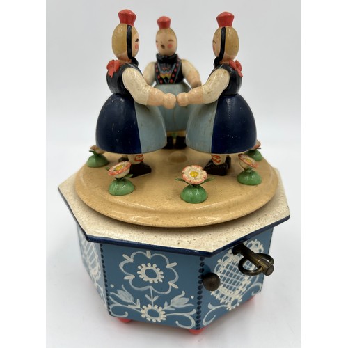 465 - A quantity of Erzgebirge hand painted German wooden music boxes, Wendt & Kuhn to include Apple, Gard... 